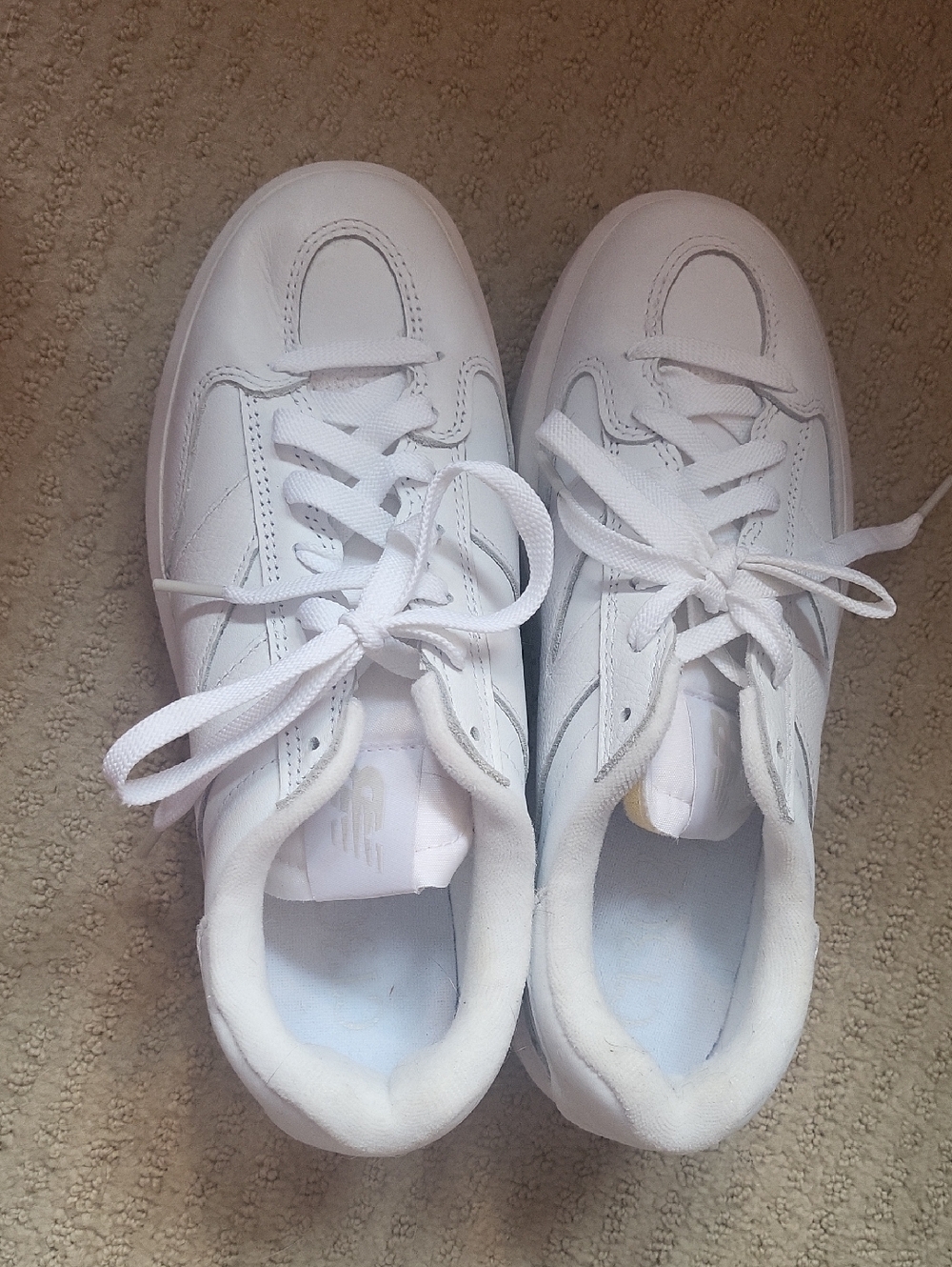 All-White New Balance Sneakers